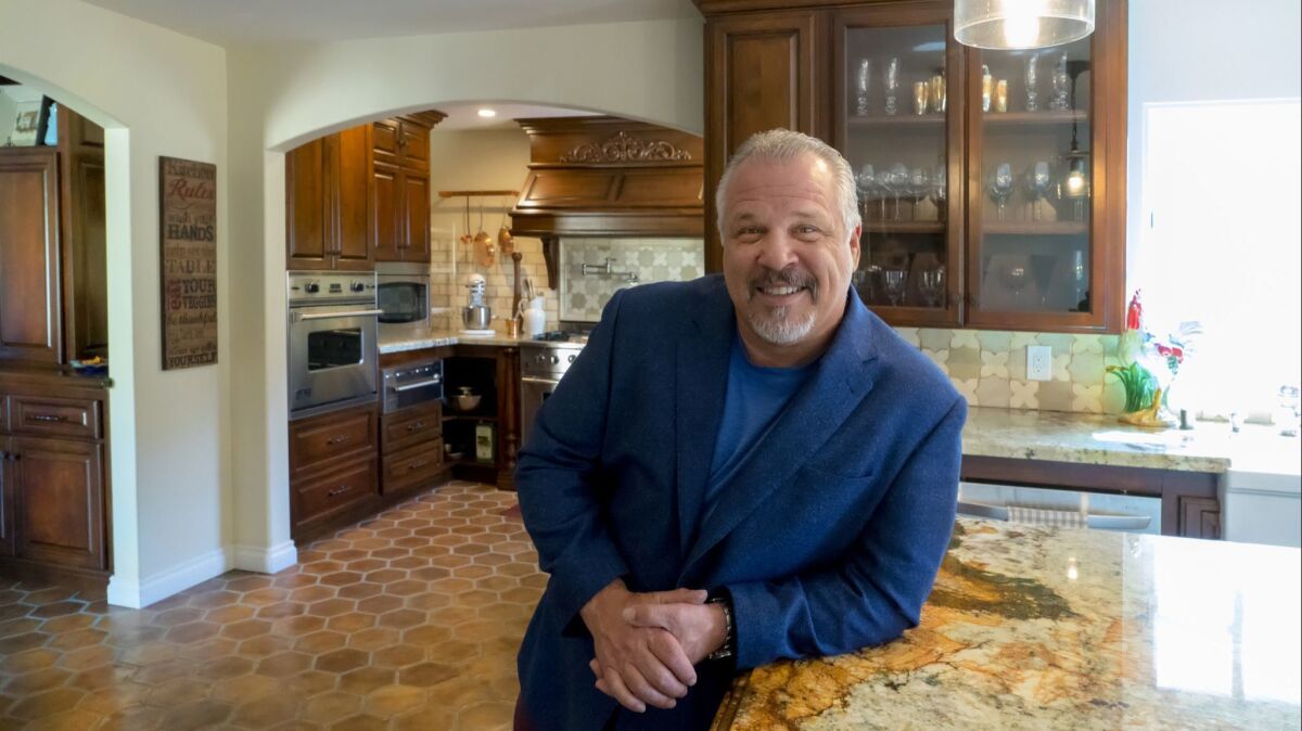 Chef Frank Terzoli in the kitchen of his Point Loma home.