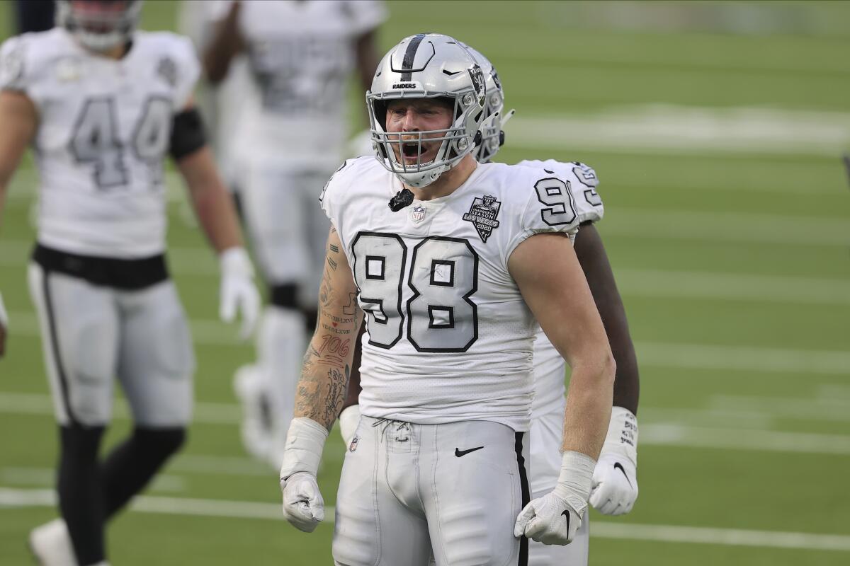 Las Vegas Raiders defensive end Maxx Crosby celebrates a sack against the Chargers on Nov. 8.