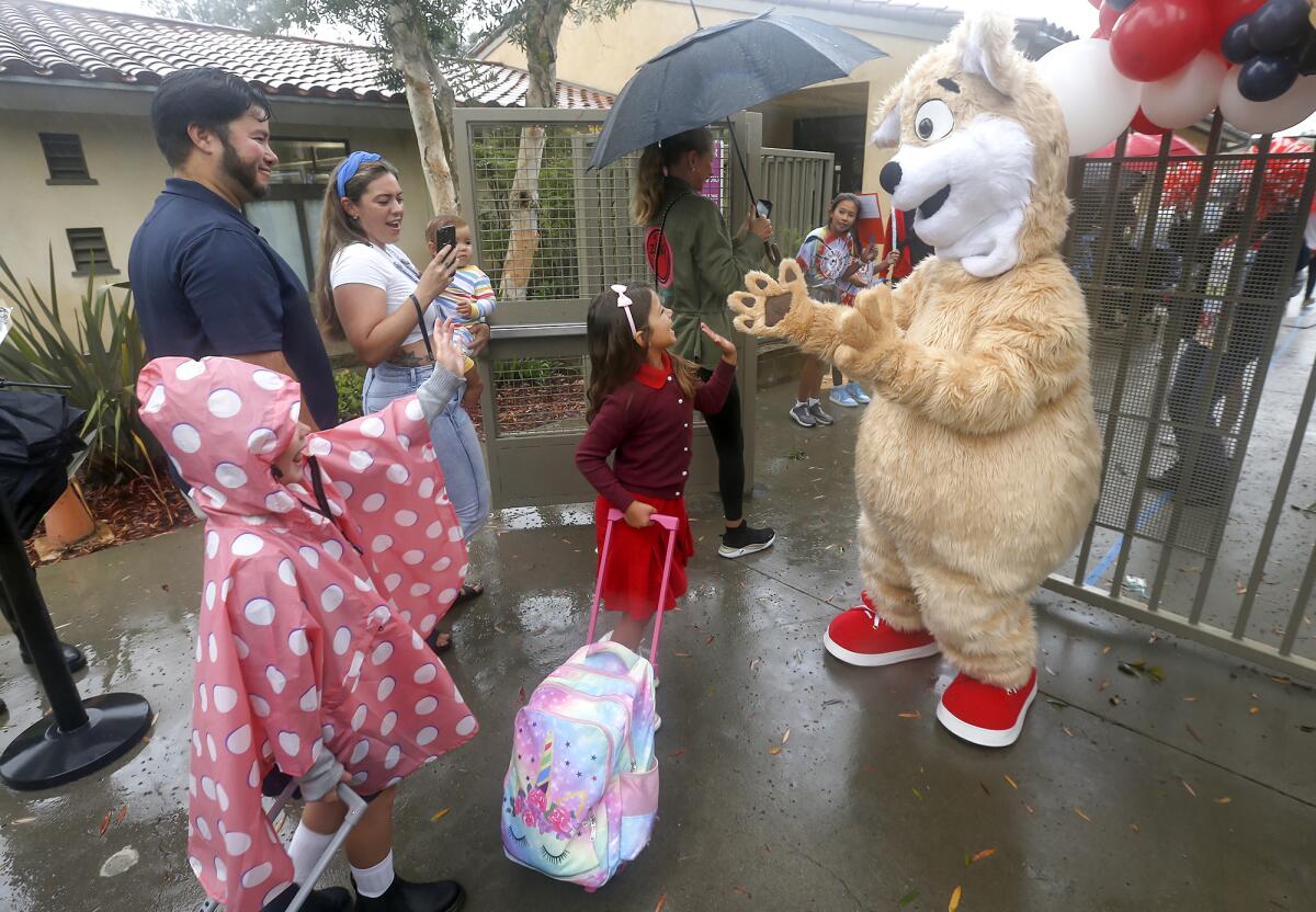 The mascot at Newport Coast Elementary welcomes kids and their parents.