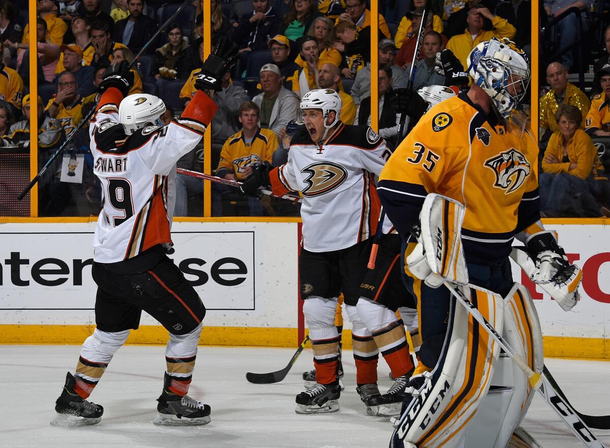 Shawn Horcoff and Chris Stewart of Ducks celebrate a goal against Predators goaltender Pekka Rinne during the second period of a game on April 21.