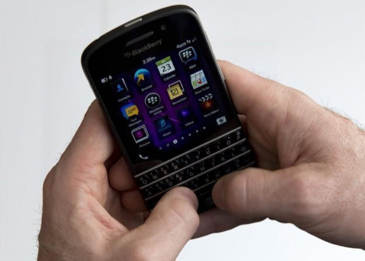 A BlackBerry device with a keyboard.