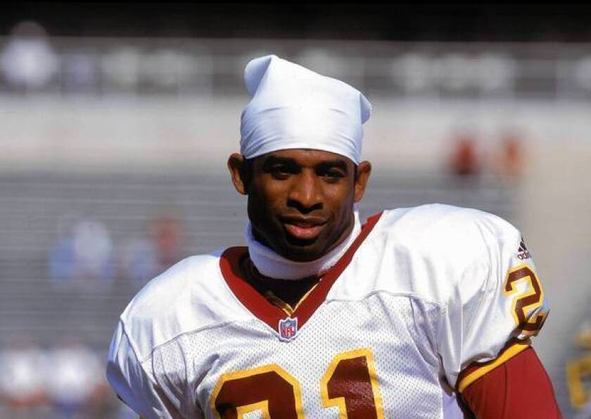 Football player Deion Sanders is shown in 2000, when he played for the Washington Redskins. He has a workers' compensation claim pending in California for head trauma and other injuries sustained while playing for the Dallas Cowboys.