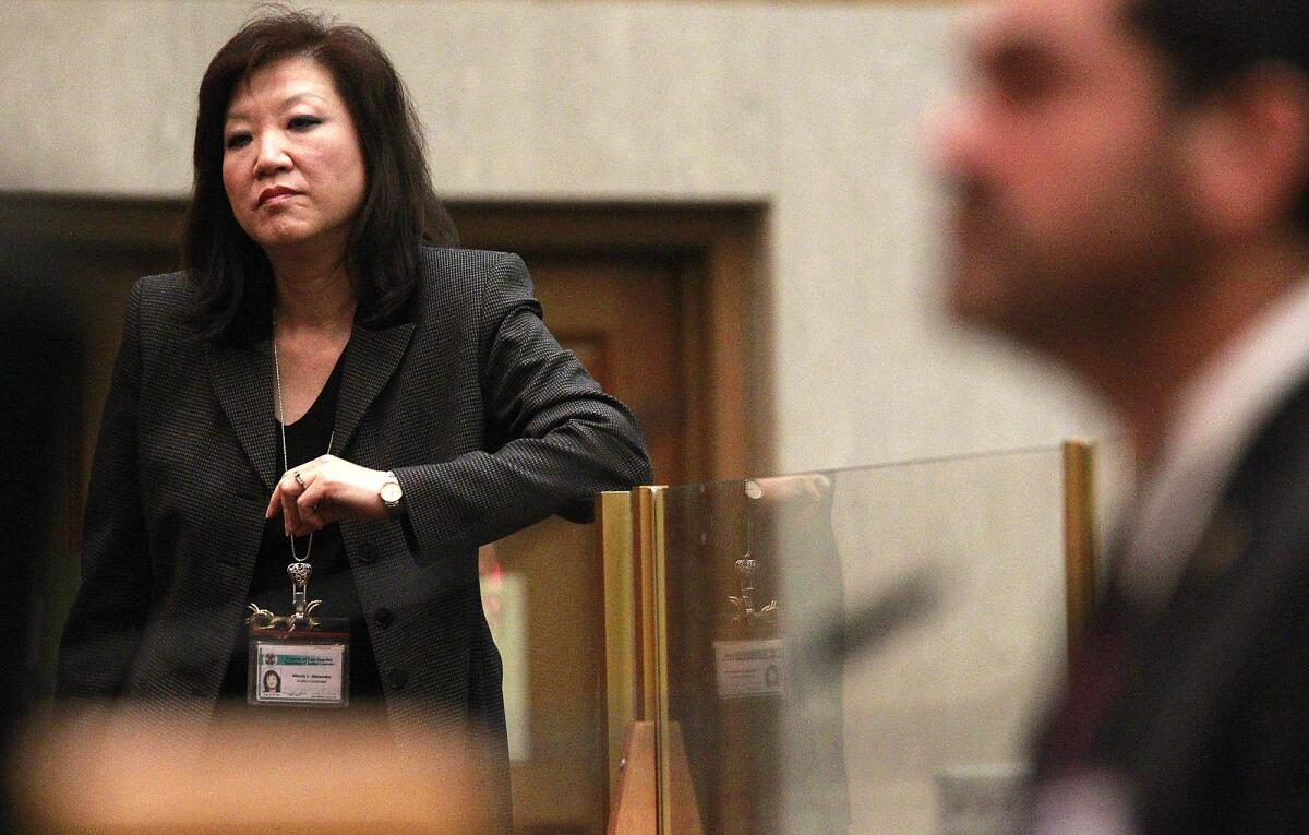 Los Angeles County Auditor-Controller Wendy Watanabe waits to speak as Assessor John Noguez addresses the supervisors in 2012.
