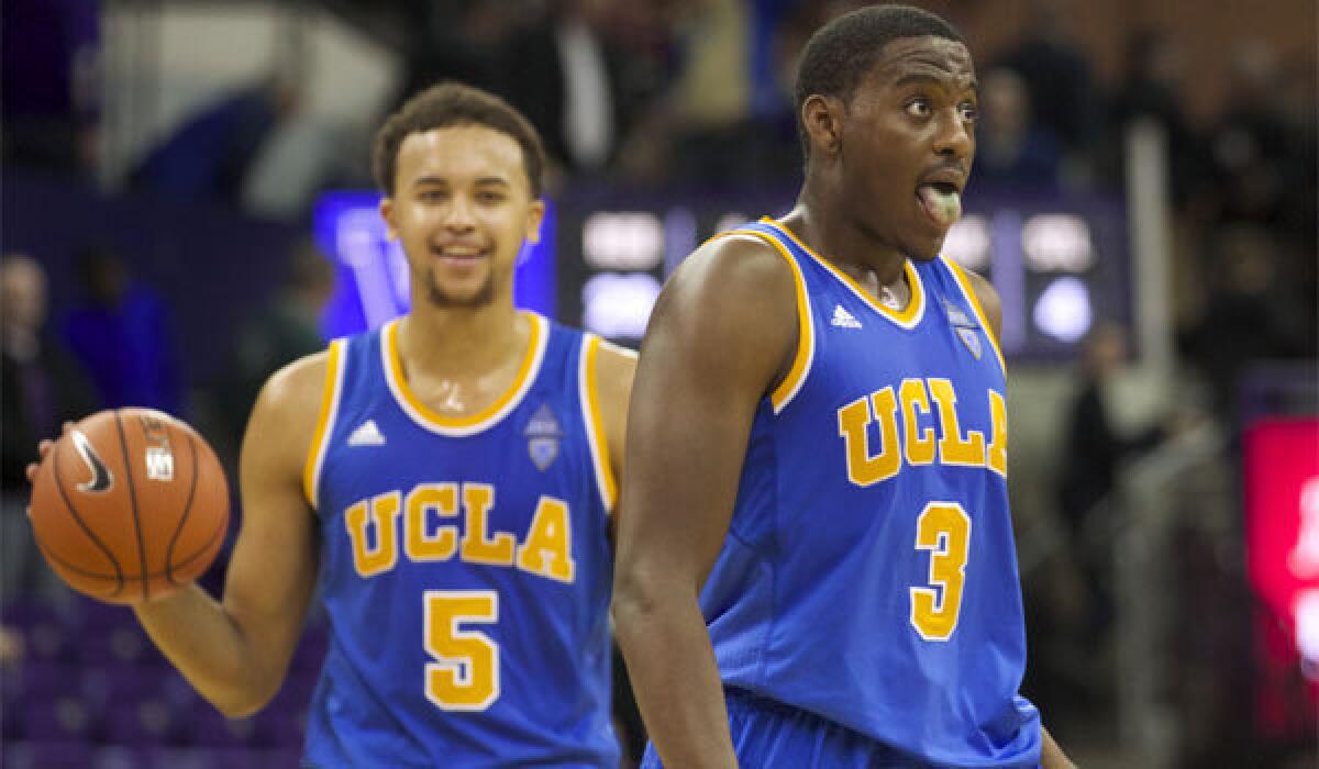 UCLA's Kyle Anderson, left, and Jordan Adams react to defeating Washington, 91-82, on March 6.