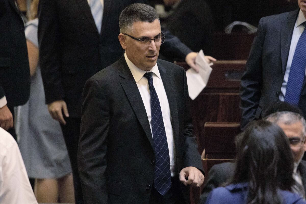 FILE - In this Thursday, Oct. 3, 2019 file photo, Gideon Saar, attends the swearing-in of the new Israeli parliament in Jerusalem. Saar, the leading rival of Prime Minister Benjamin Netanyahu inside the ruling Likud party, announced on Tuesday, Dec. 8, 2020 that he was breaking away to form a new political party ahead of elections expected early next year. (AP Photo/Ariel Schalit, File)