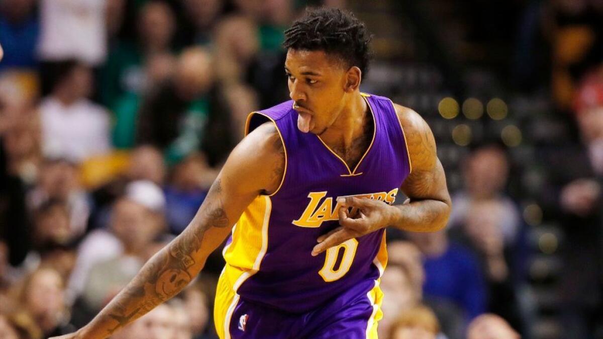 Thieves broke into the Tarzana home of former Lakers guard Nick Young and stole a safe containing $500,000 in valuables, police said.