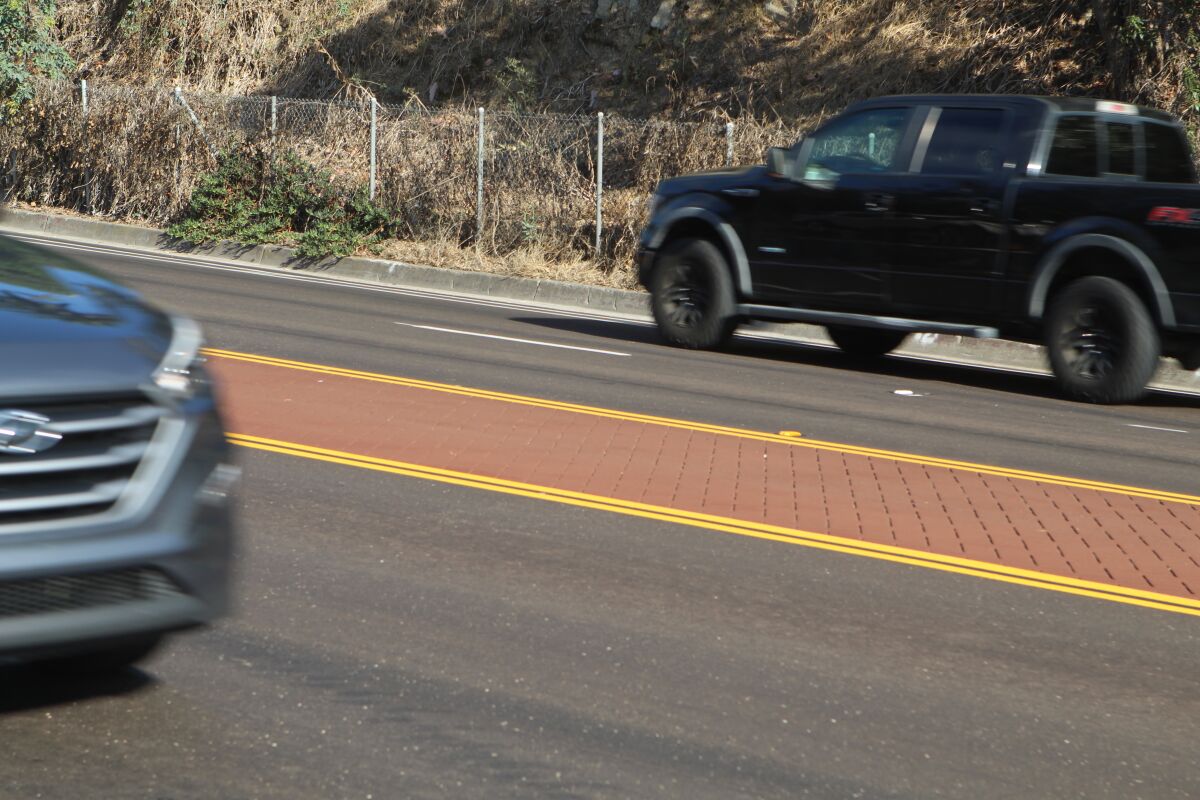 The stamped median on Torrey Pines Road resembles in-laid brick.
