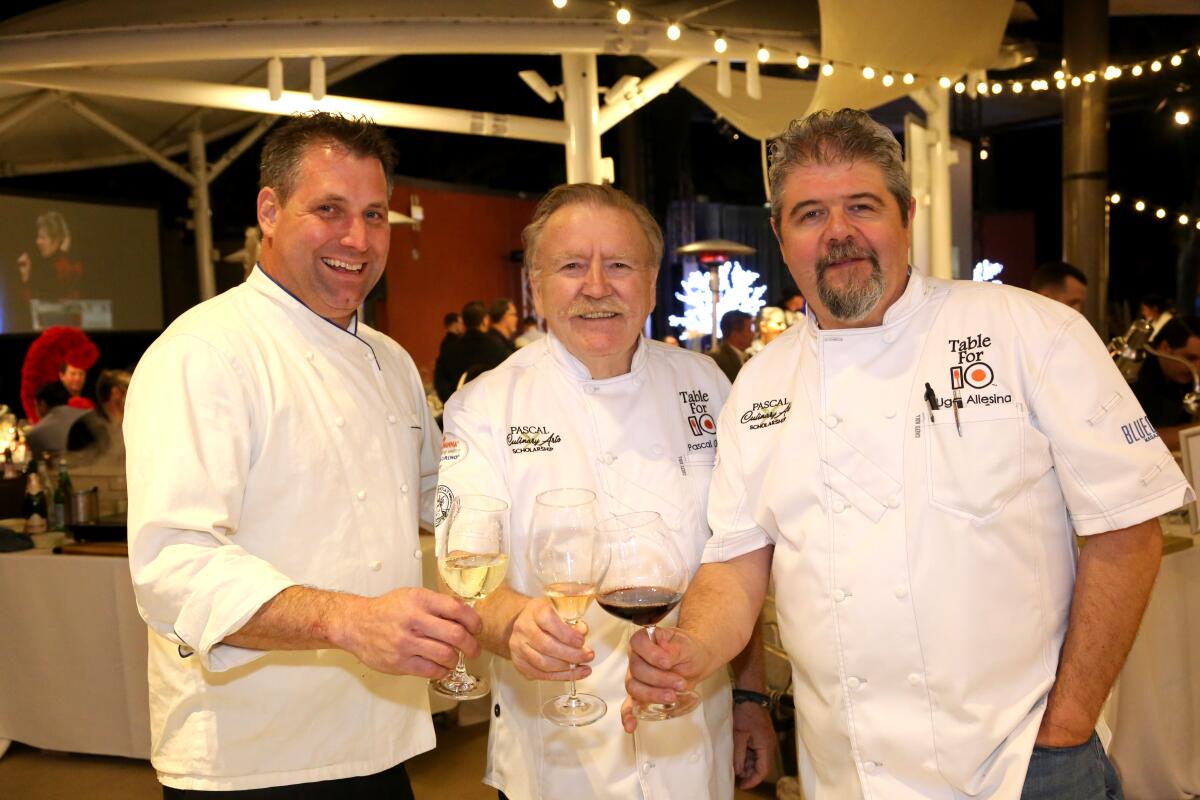 Table for 10 venue host chef Donald Lockhart, left, with event chair Chef Pascal Olhats and Honorary Chef Ugo Allesina. 