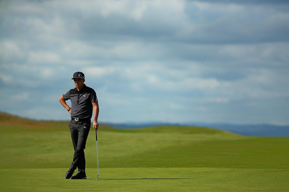 Rickie Fowler waits on the seventh green Thursday during the first round of the Scottish Open at Gullane Golf Club in Aberdeen, Scotland.