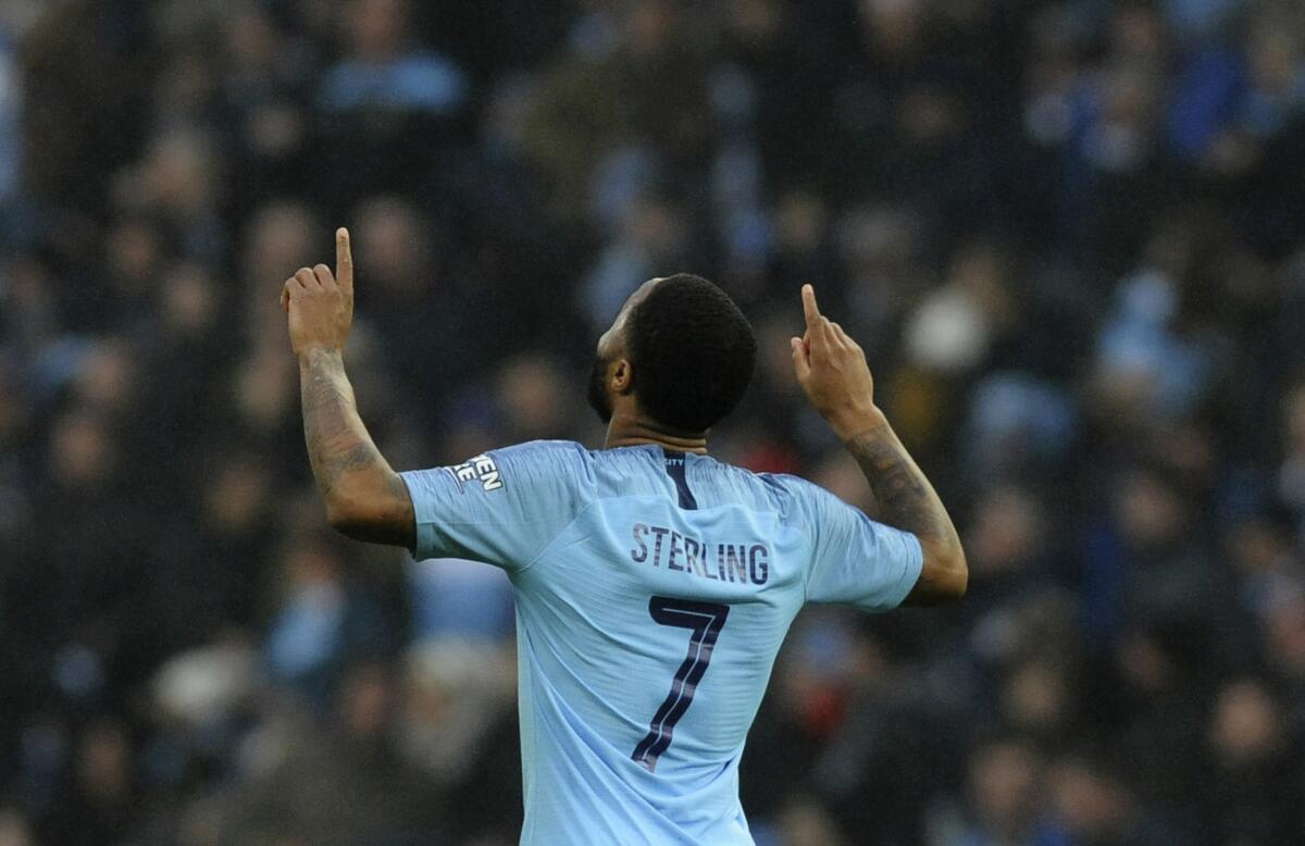 FILE - Manchester City's Raheem Sterling celebrates after scoring the opening goal of the game during the English FA Cup third round soccer match between Manchester City and Rotherham United at Etihad stadium in Manchester, England, Sunday, Jan. 6, 2019. Sterling is edging closer to a move to Chelsea as he bids farewell to Manchester City. Sterling is on the cusp of completing a transfer of around $60 million to City’s Premier League rival. (AP Photo/Rui Vieira, File)