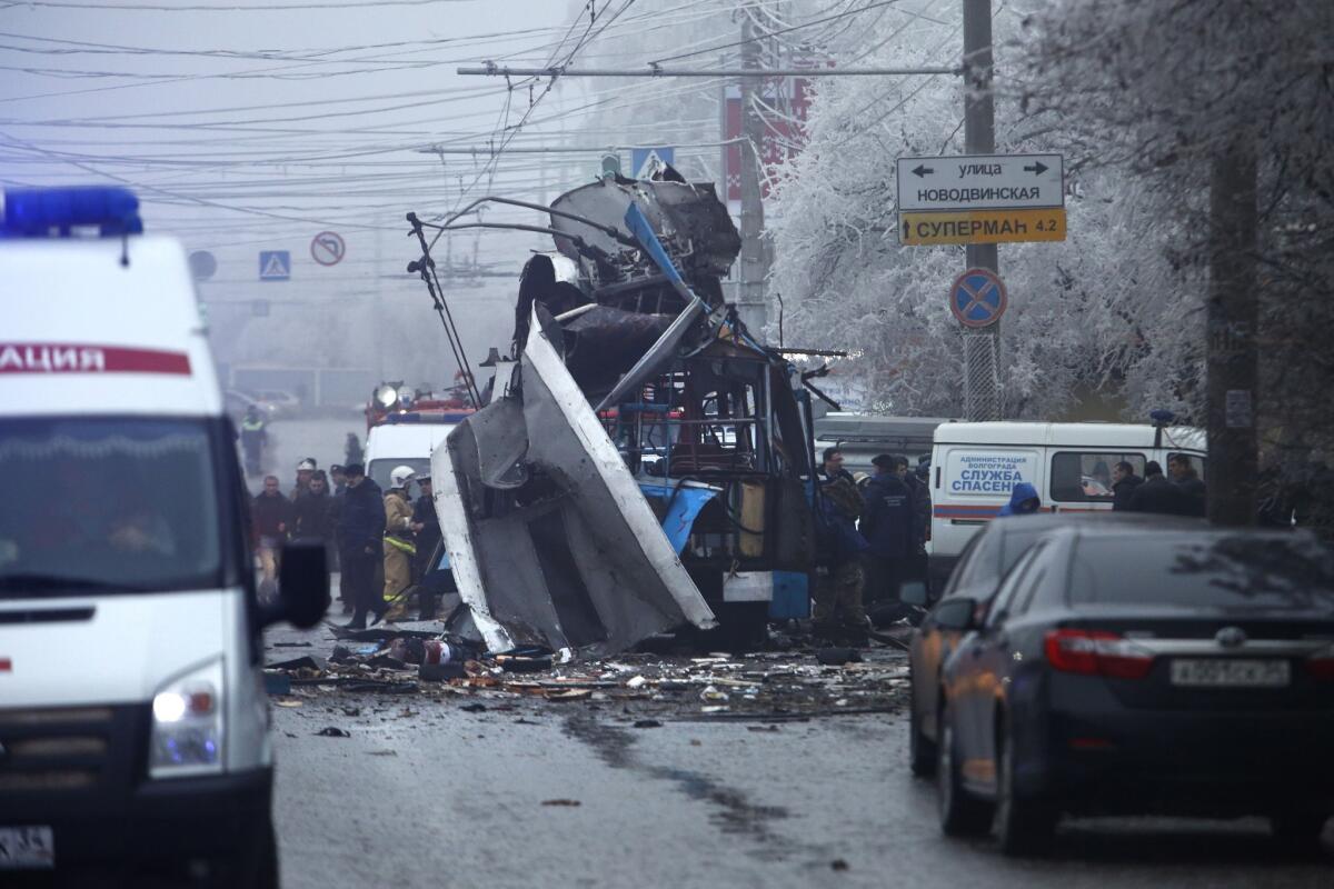 Investigators examine the site of a trolley bus explosion in Volgograd, Russia.