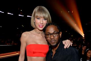 Taylor Swift and Kendrick Lamar attend The 58th GRAMMY Awards in 2016.