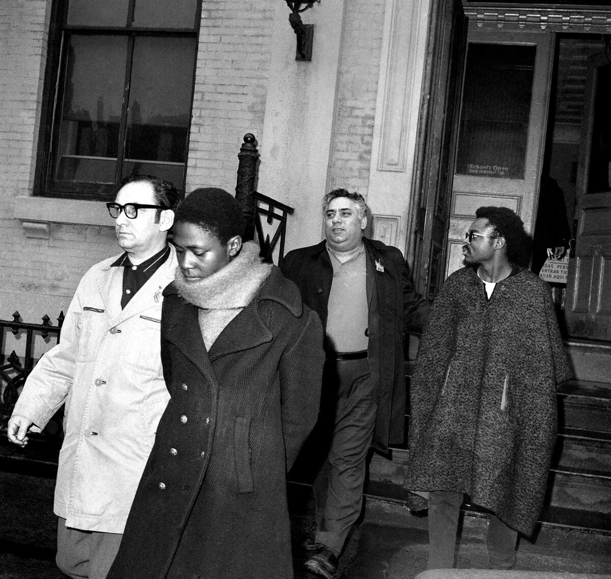Afeni Shakur and her husband, Lumumba Shakur, are escorted from an NYPD station 1969
