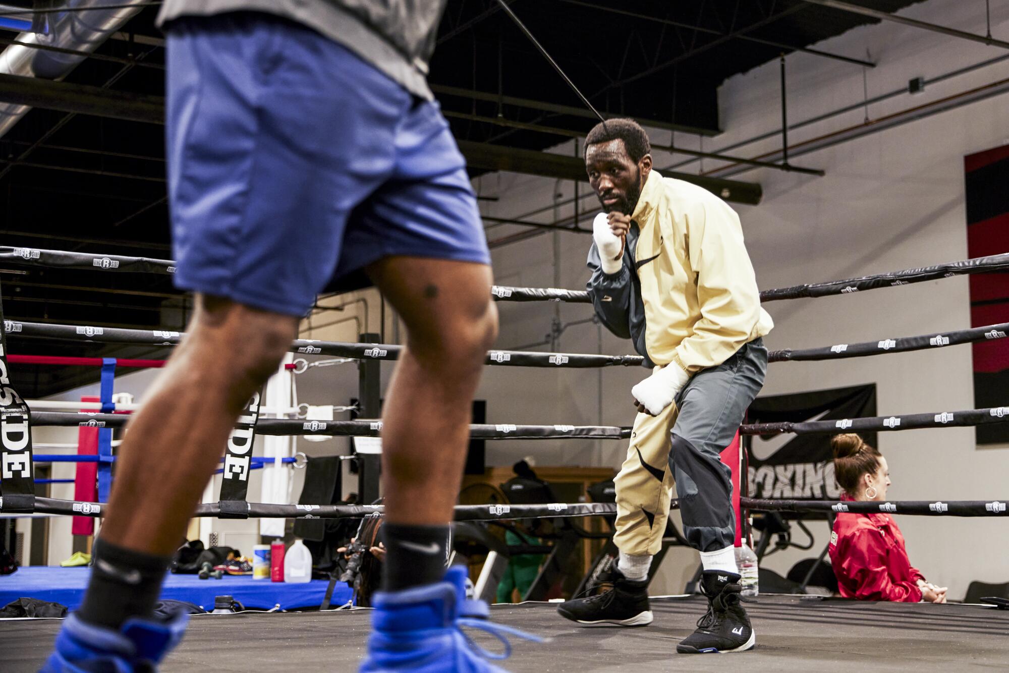 Terence 'Bud' Crawford stands in the ring during a training session at the Triple Threat Boxing Gym 