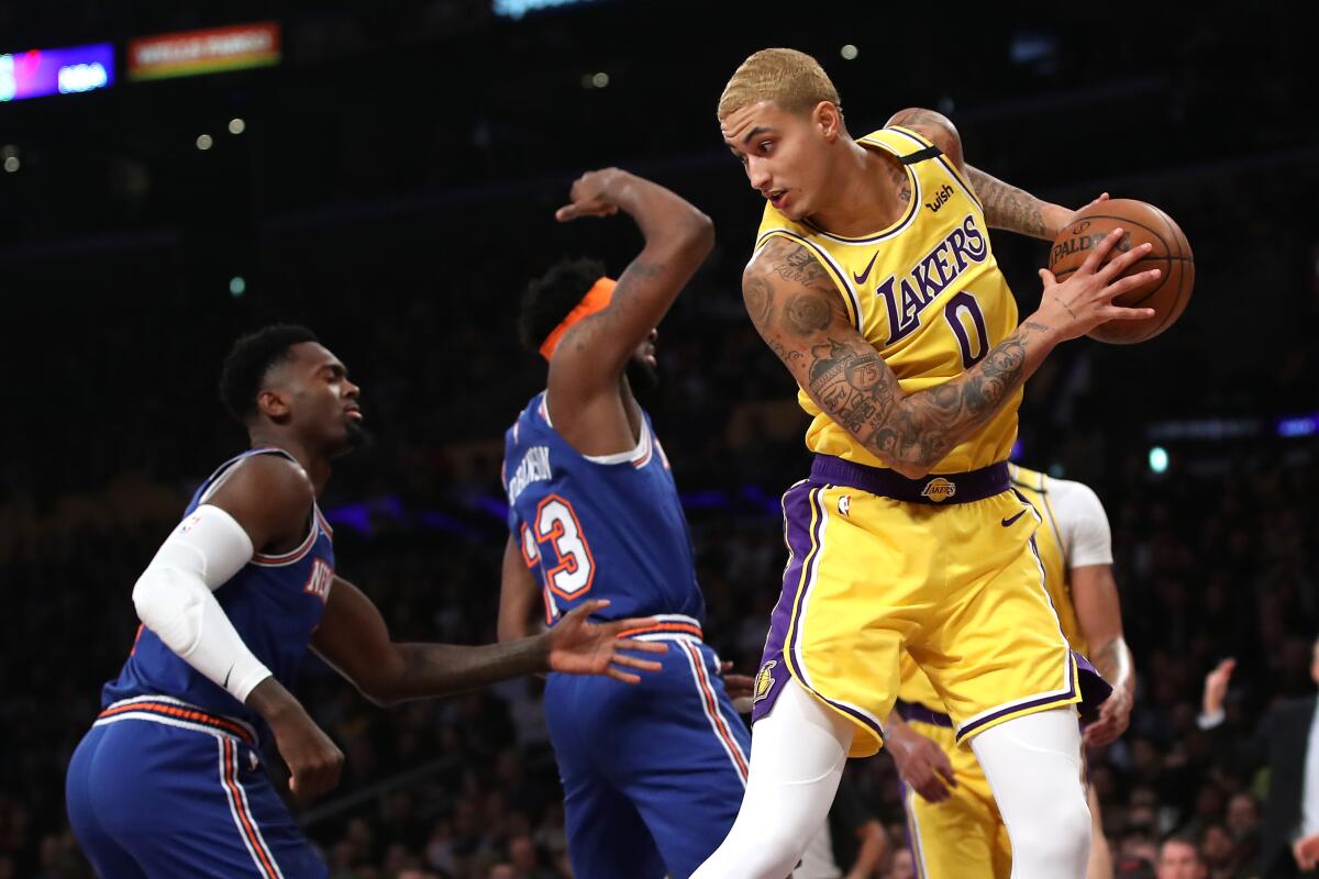 LOS ANGELES, CALIFORNIA - JANUARY 07: Kyle Kuzma #0 of the Los Angeles Lakers rebounds the ball during the first half of a game against the New York Knicks at Staples Center on January 07, 2020 in Los Angeles, California. NOTE TO USER: User expressly acknowledges and agrees that, by downloading and/or using this photograph, user is consenting to the terms and conditions of the Getty Images License Agreement (Photo by Sean M. Haffey/Getty Images) ** OUTS - ELSENT, FPG, CM - OUTS * NM, PH, VA if sourced by CT, LA or MoD **