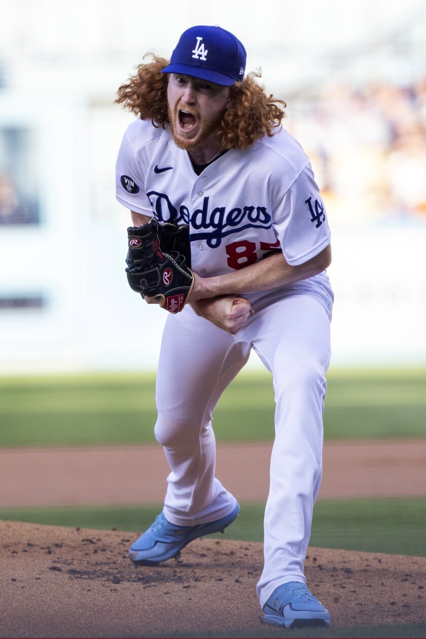 Dodgers starter Dustin May is fired up after he struck out the Marlins' Nick Fortes during the first inning Aug. 20, 2022. 