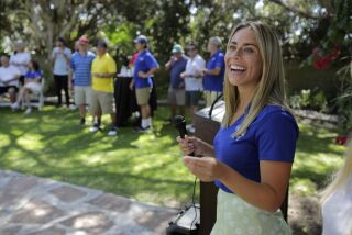Madison Scharbarth works a raffle during a fundraiser for Kathy's Legacy which raises money for juvenile victims of domestic violence at St. Mark's Golf Club in San Marcos, Saturday, 09/26/20. Madison, 22, was 13 when her mother was murdered at their home in Carlsbad. photo by Bill Wechter