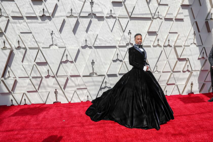 Billy Porter in his iconic tuxedo dress at the Oscars Red Carpet 2019.