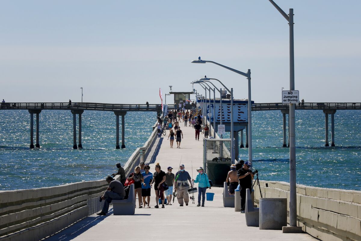 The Ocean Beach Pier reopened June 9 after being shuttered for months during the coronavirus pandemic.