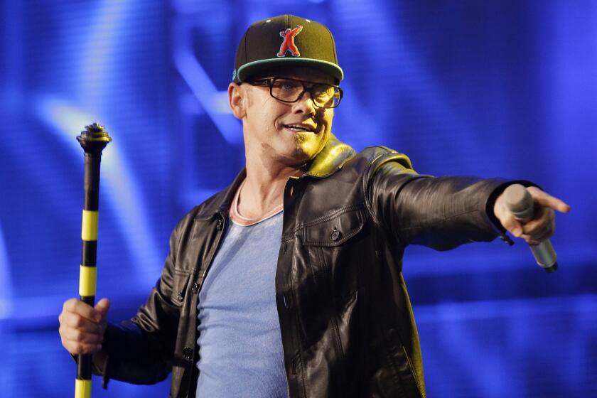 TobyMac performs at the Dove Awards on Tuesday in Nashville. The veteran rapper was named artist of the year.