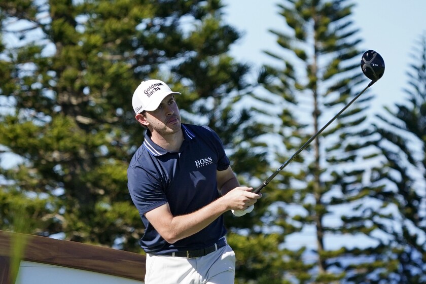 Patrick Cantlay hits from the ninth tee during the Tournament of Champions pro-am team play golf event, Wednesday, Jan. 5, 2022, , at Kapalua Plantation Course in Kapalua, Hawaii. (AP Photo/Matt York)