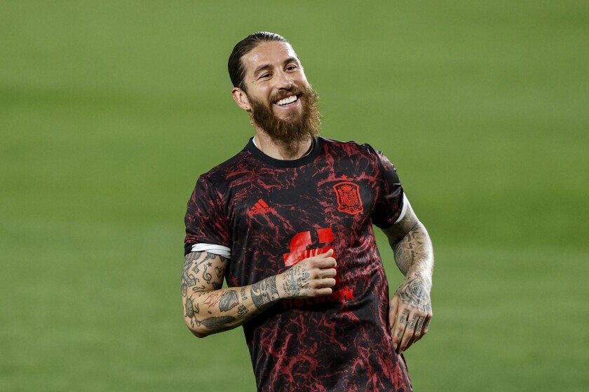 Spain's Sergio Ramos during the warm up prior of the World Cup 2022 group B qualifying soccer match between Spain and Greece at the Los Carmenes stadium in Granada, Spain, Thursday, March 25, 2021. (AP Photo/Fermin Rodriguez)