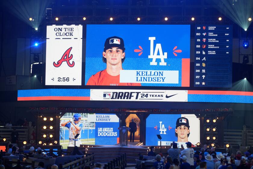 A photo of Kellon Lindsey is shown on the video board after Lindsey was selected 23rd overall.