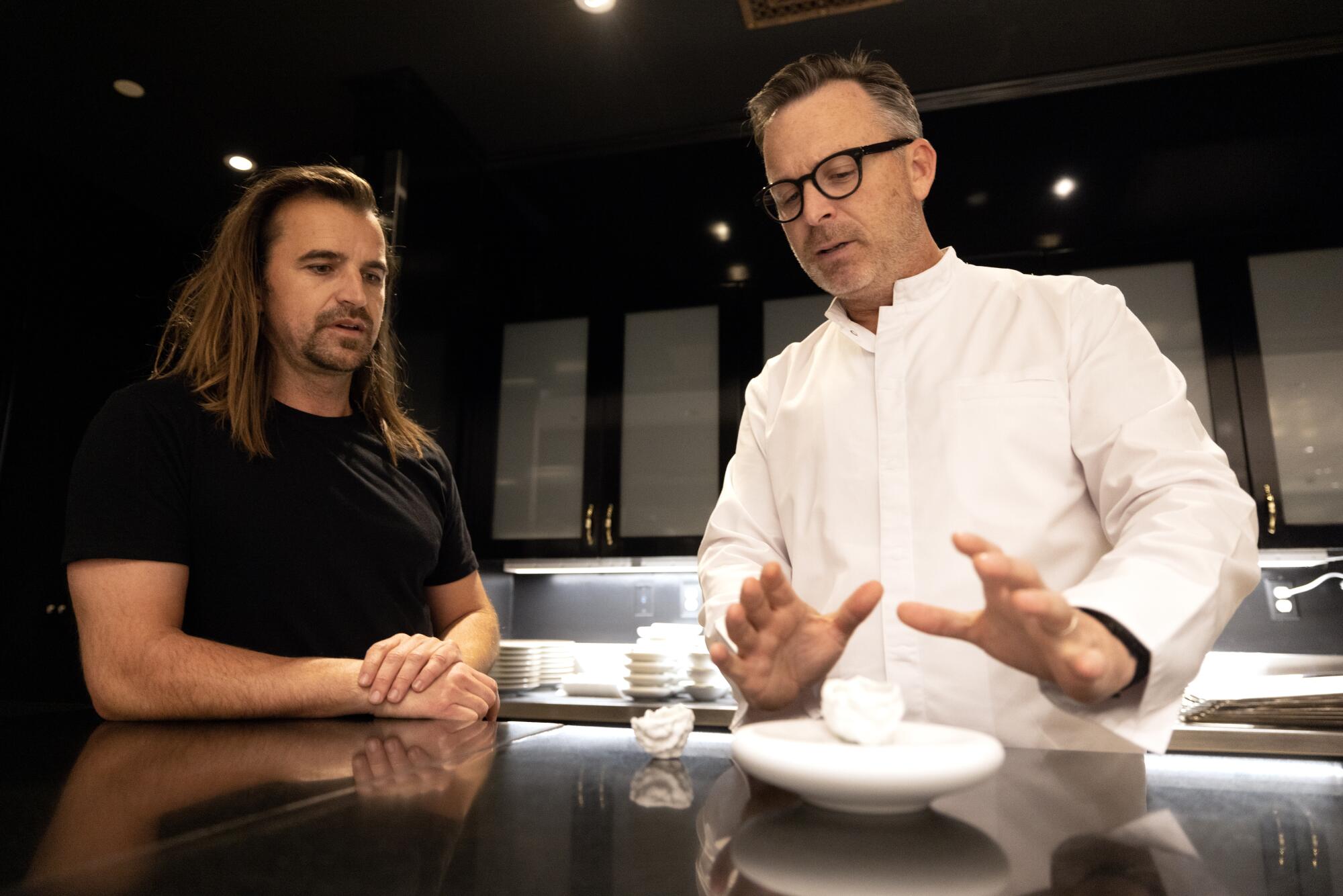 Food photographer Eric Wolfinger (left) and Addison restaurant chef director William Bradley