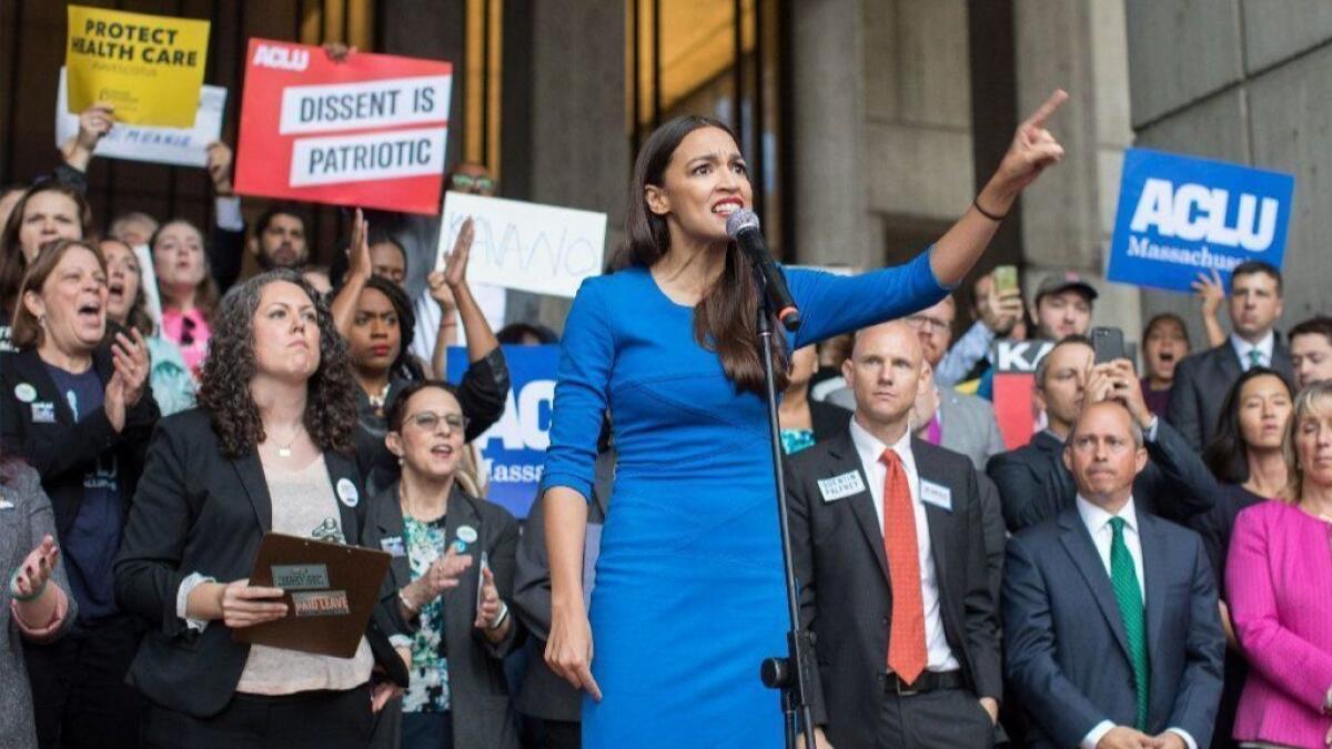 New York Democratic congressional candidate Alexandria Ocasio-Cortez speaks at a rally in Boston on Oct. 1.