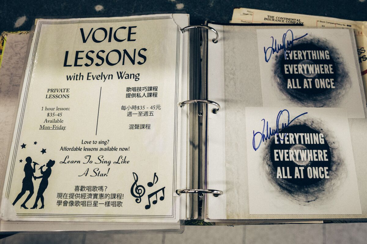 A binder with prop items that were used during the filming of "Everything Everywhere All at Once."