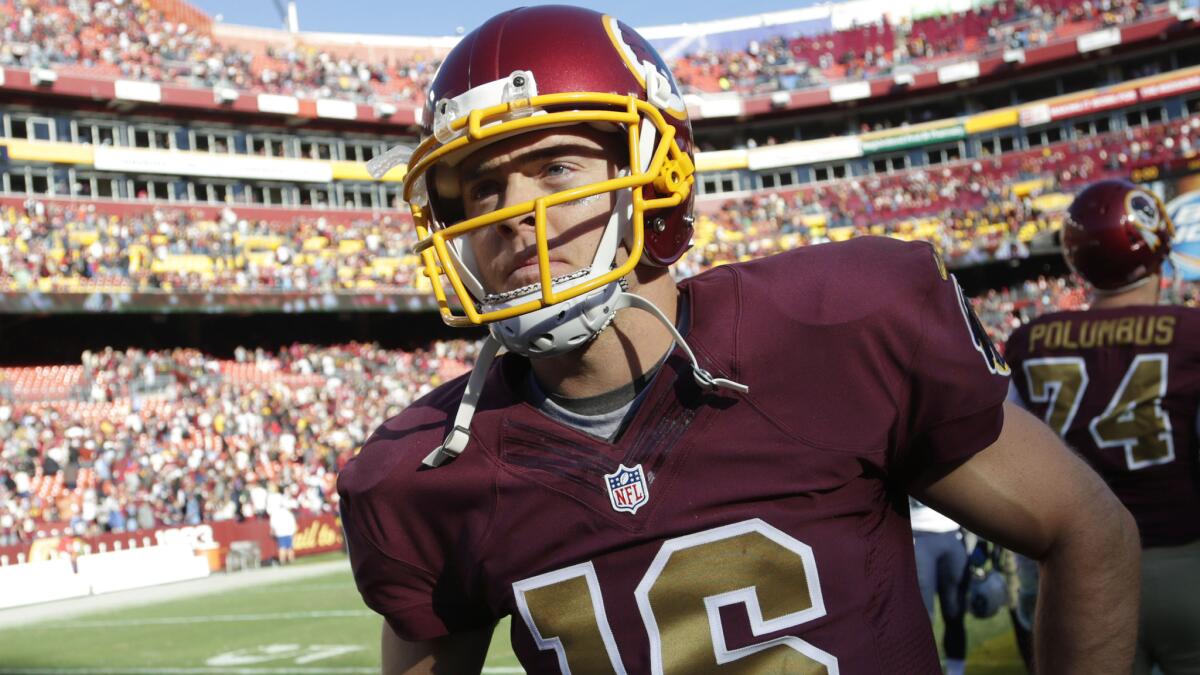 Washington Redskins quarterback Colt McCoy looks on during a game against the Tennessee Titans on Oct. 19.