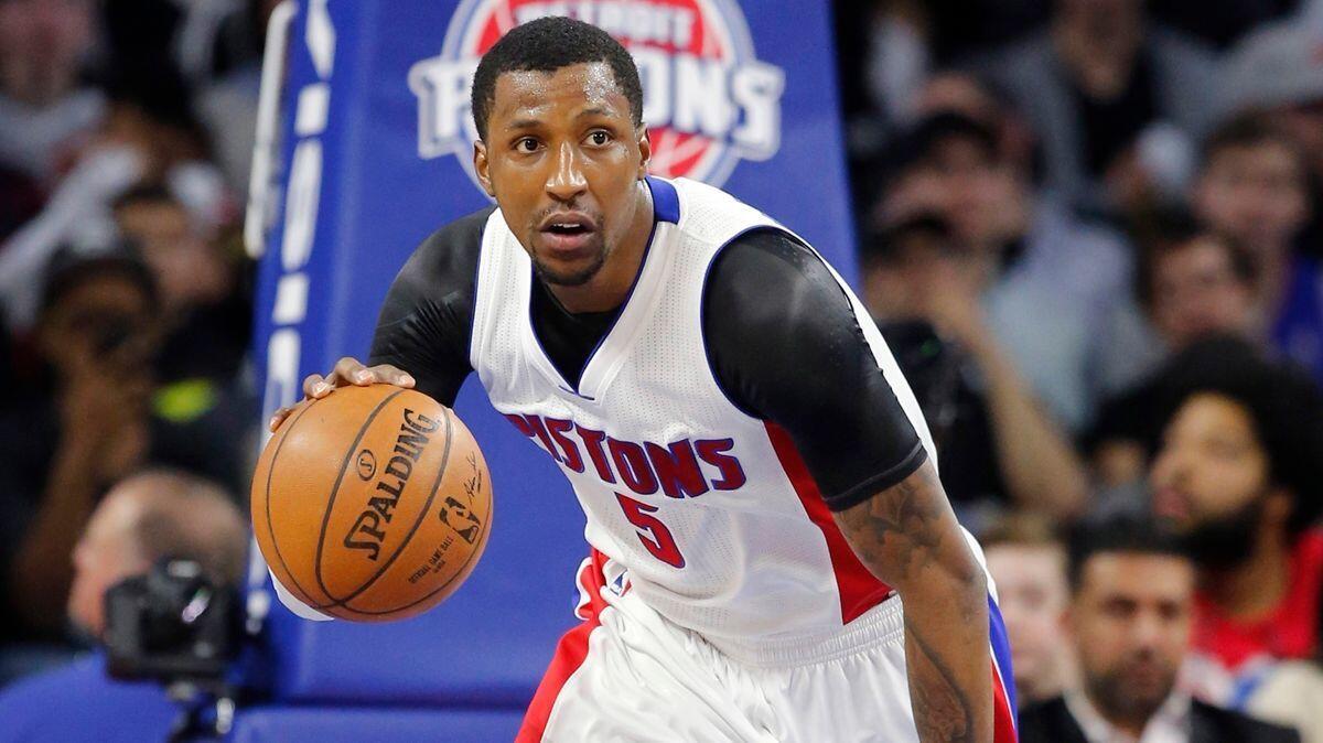Kentavious Caldwell-Pope brings the ball up court during a game between the Detroit Pistons and San Antonio Spurs on Feb. 17. Caldwell-Pope has agreed to a one-year deal with the Lakers.