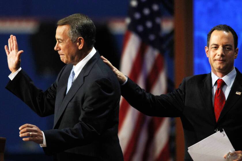 Republican National Committee Chairman Reince Priebus pats House Speaker John A. Boehner on the shoulder after Boehner’s speech at the Republican National Convention in Tampa, Fla. Boehner let House Republicans decide for themselves whether they would attend.