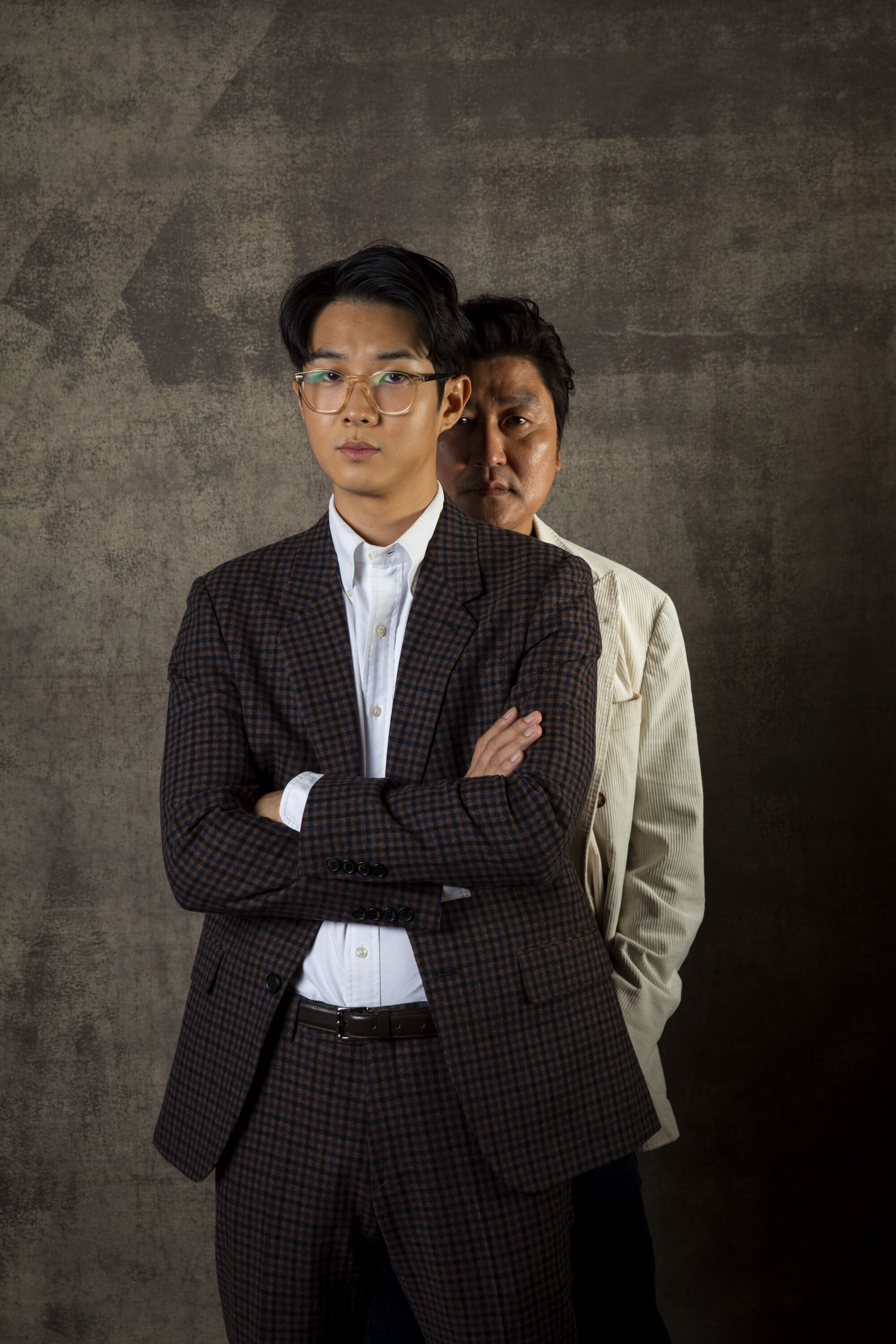 Choi Woo Shik, front, and Song Kang Ho