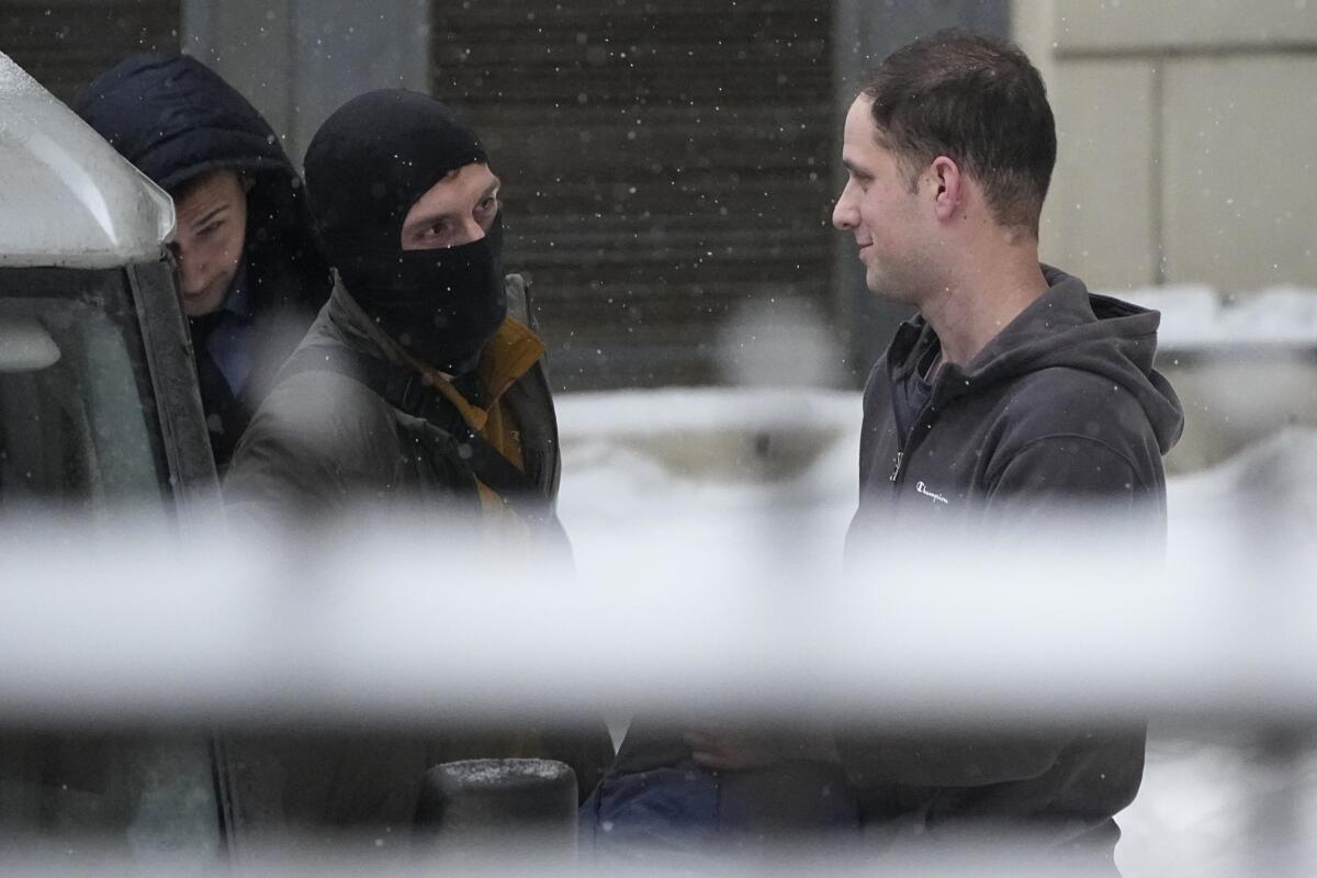 Wall Street Journal reporter Evan Gershkovich being escorted from court in Moscow