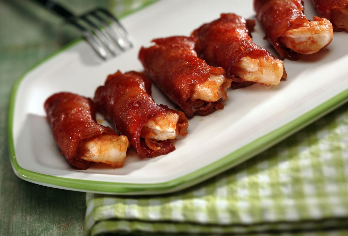 Wrap these shrimp in lean turkey bacon for a guilt-free snack sure to please every guest.