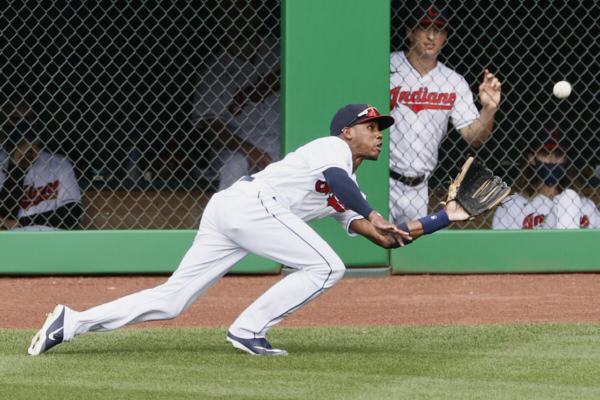 Greg Allen, then with the Cleveland Indians, makes a diving catch in an Aug. 23 game.