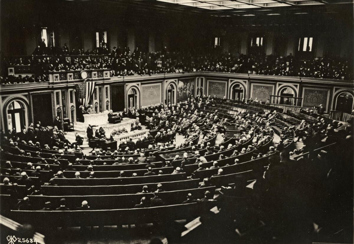 Nov. 11, 1918: U.S. President Wilson reads the terms of the armistice to Congress.