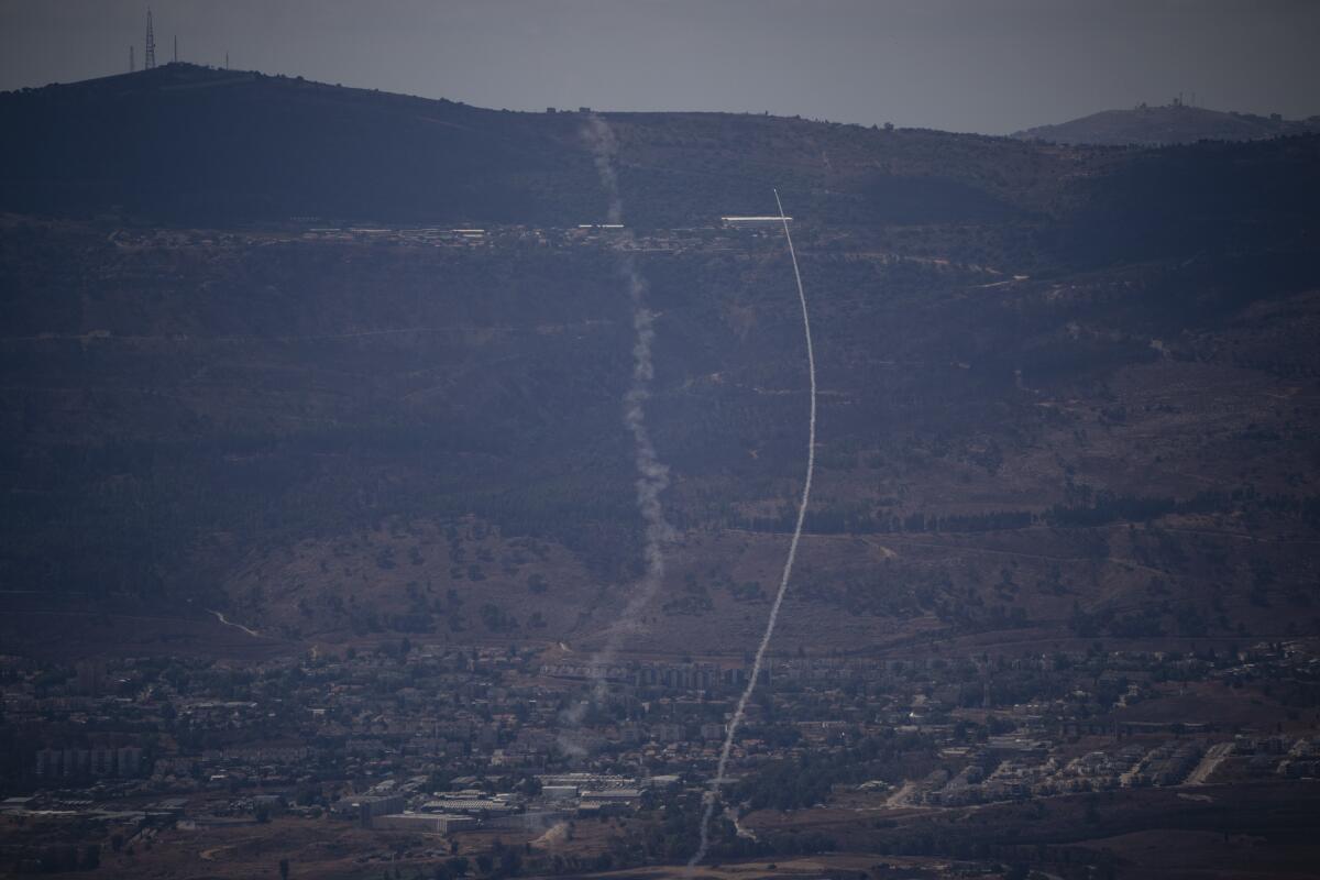 The Israeli Iron Dome air defense system fires to intercept an attack from Lebanon.