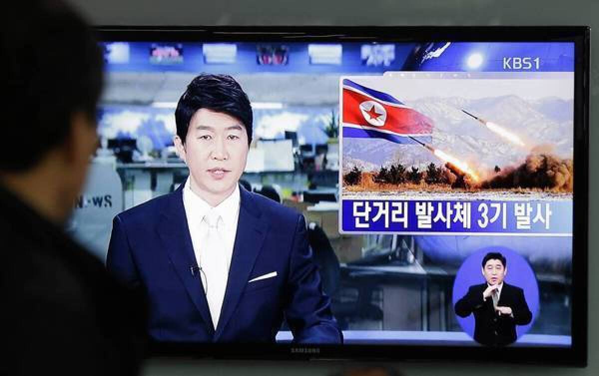 A TV news report in Seoul describes North Korea's launch of three short-range missiles, which a South Korean official said fell into the sea.