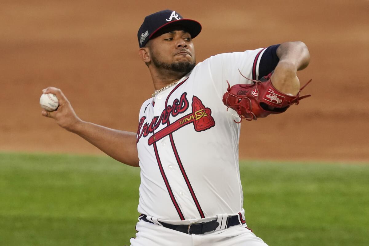 Atlanta Braves relief pitcher Huascar Ynoa throws against the Dodgers during the third inning of Game 3 of the NLCS.