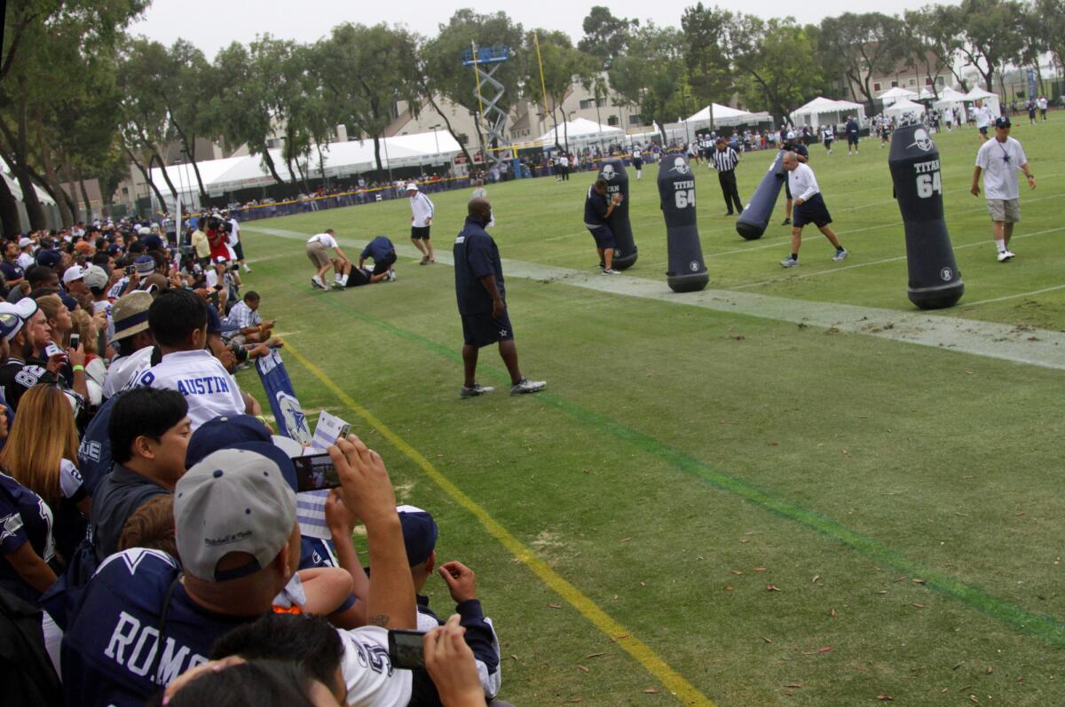 Fans can get close to the action at Cowboys' training camp in Oxnard, starting July 24. Above, the Cowboys' 2013 camp.