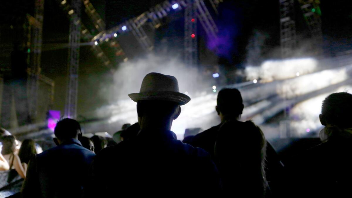 The crowd watches a performance at the Hard Summer music festival at the Auto Club Speedway on July 31.