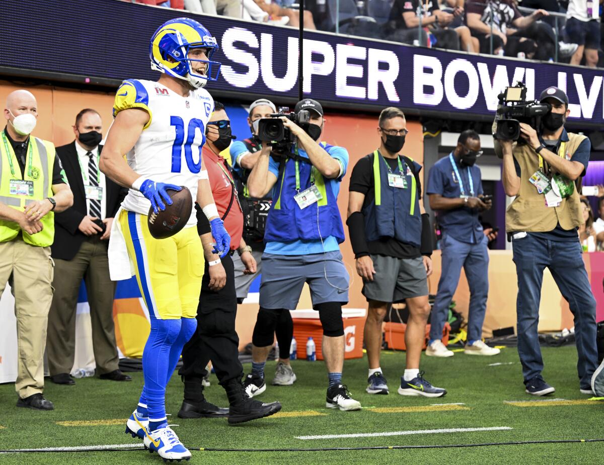 Rams receiver Cooper Kupp celebrates after a touchdown catch during the first half of Super Bowl LVI.