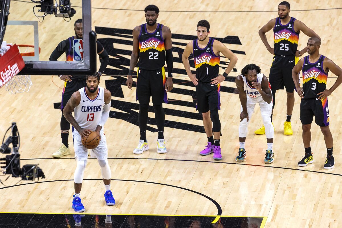 Clippers guard Paul George shoots a technical free throw during Game 5 against the Phoenix Suns.