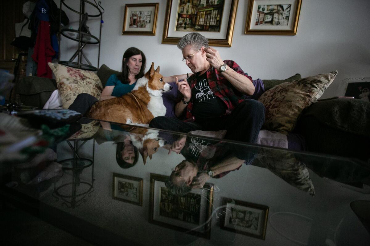 Ted and Sandy Rogers of Hollywood enjoy time with their foster corgi.