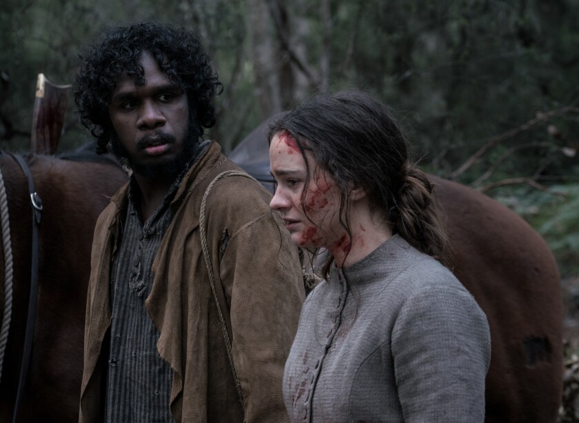 Baykali Ganambarr and Aisling Franciosi in the movie "The Nightingale."
