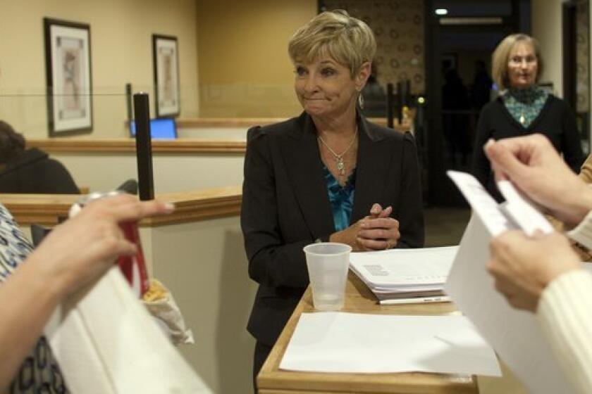 Former state Sen. Sharon Runner, center, during her 2011 election campaign. The FPPC said she and her staff cooperated with the investigation.