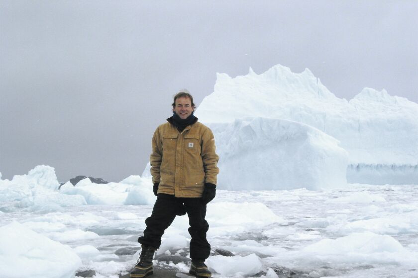Photo License is limited to editorial PR for the promotion of Patagonia Book “Waves and Beaches” only. Photo Credit: Kim McCoy Collection Caption: KIM MCCOY adventurer, oceanographer, engineer, inventor, sailor, feediver, paraglider, and polyglot, in Antarctica in 2002.