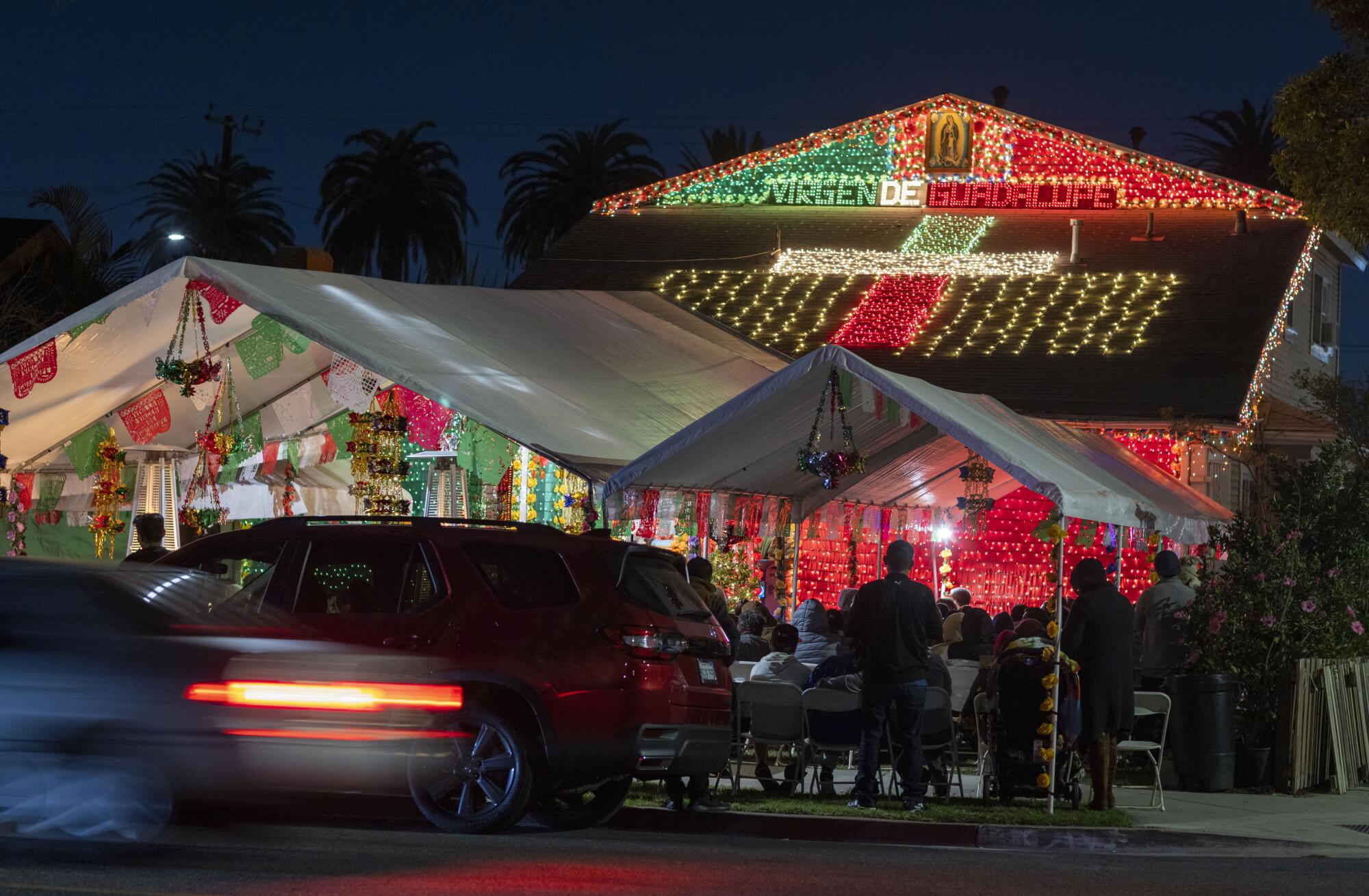 A home adorned with light has become a popular shrine in honor of the Virgen de Guadalupe